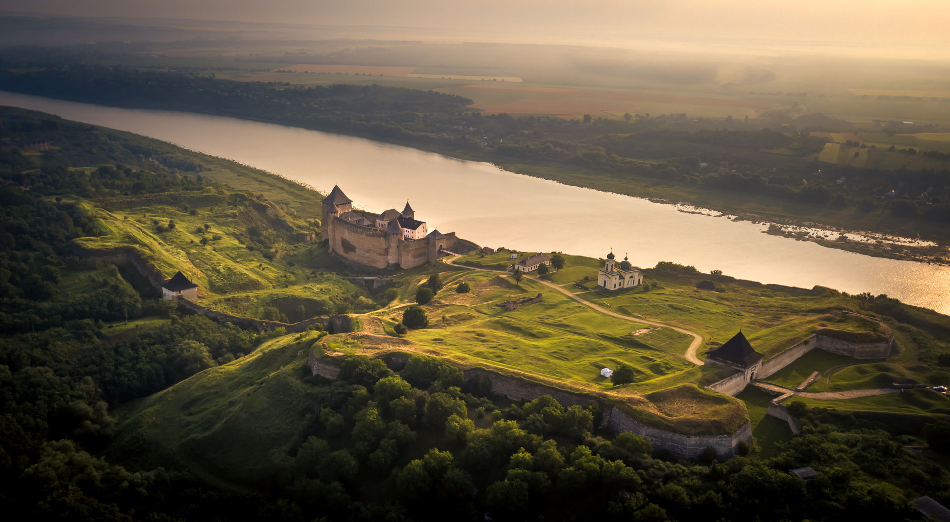 khotyn fortress, khotyn castle, seven wonders of ukraine, backpacking khotyn, how to get to khotyn, travel around ukraine, ukraine travel, drone khotyn, aerial view of khotyn, outer wall of khotyn, khotyn perimeter, khotyn travel, where to stay in khotyn, khotyn camping, khotyn wild camping