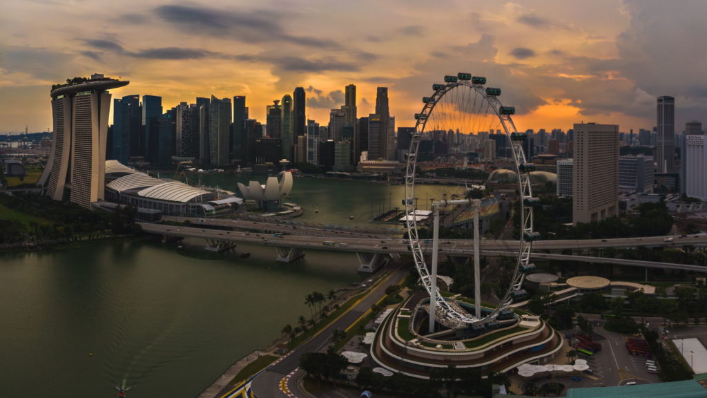 aerial view on Singapore Flyer, drone singapore, drones singapore, singapore aerial, singapore flyer drone, singapore flyer, singapore downtown sunset, singapore downtown drone, aerial view of marina bay sands, marina bay sands sunset singapore, where to fly drone at singapore, singapore drone guidelines, best drone places singapore, singapore laws, singapore regulations